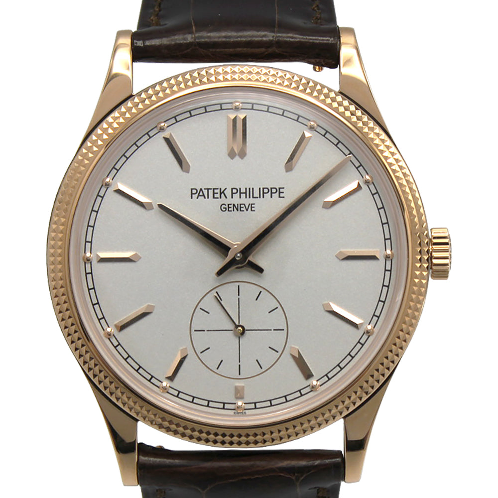 Patek Philippe Calatrava 6119R-001 hobnail bezel, and a refined brown leather strap