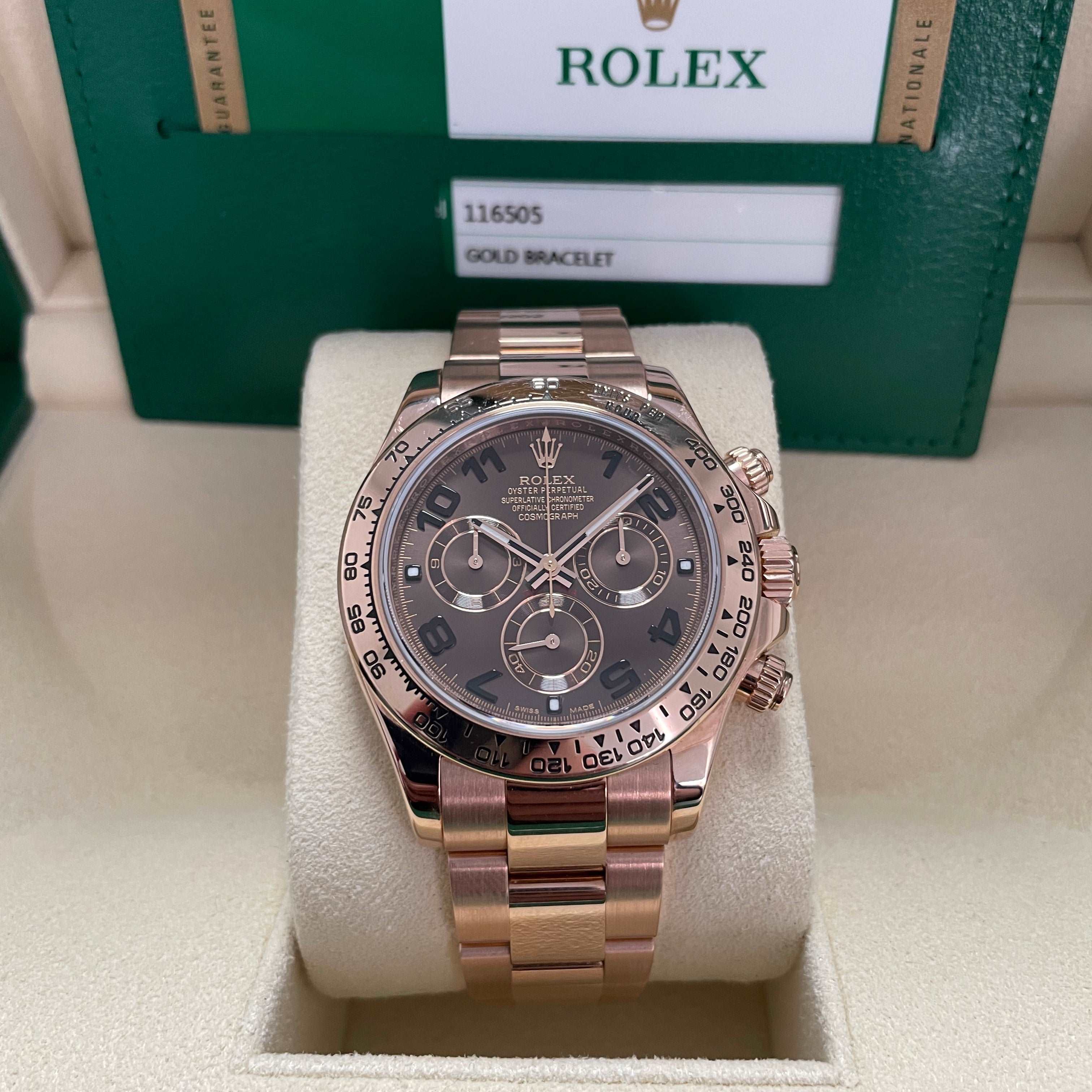 Rolex Cosmograph Daytona 116505 with a chocolate Arabic numeral dial and a rose gold case