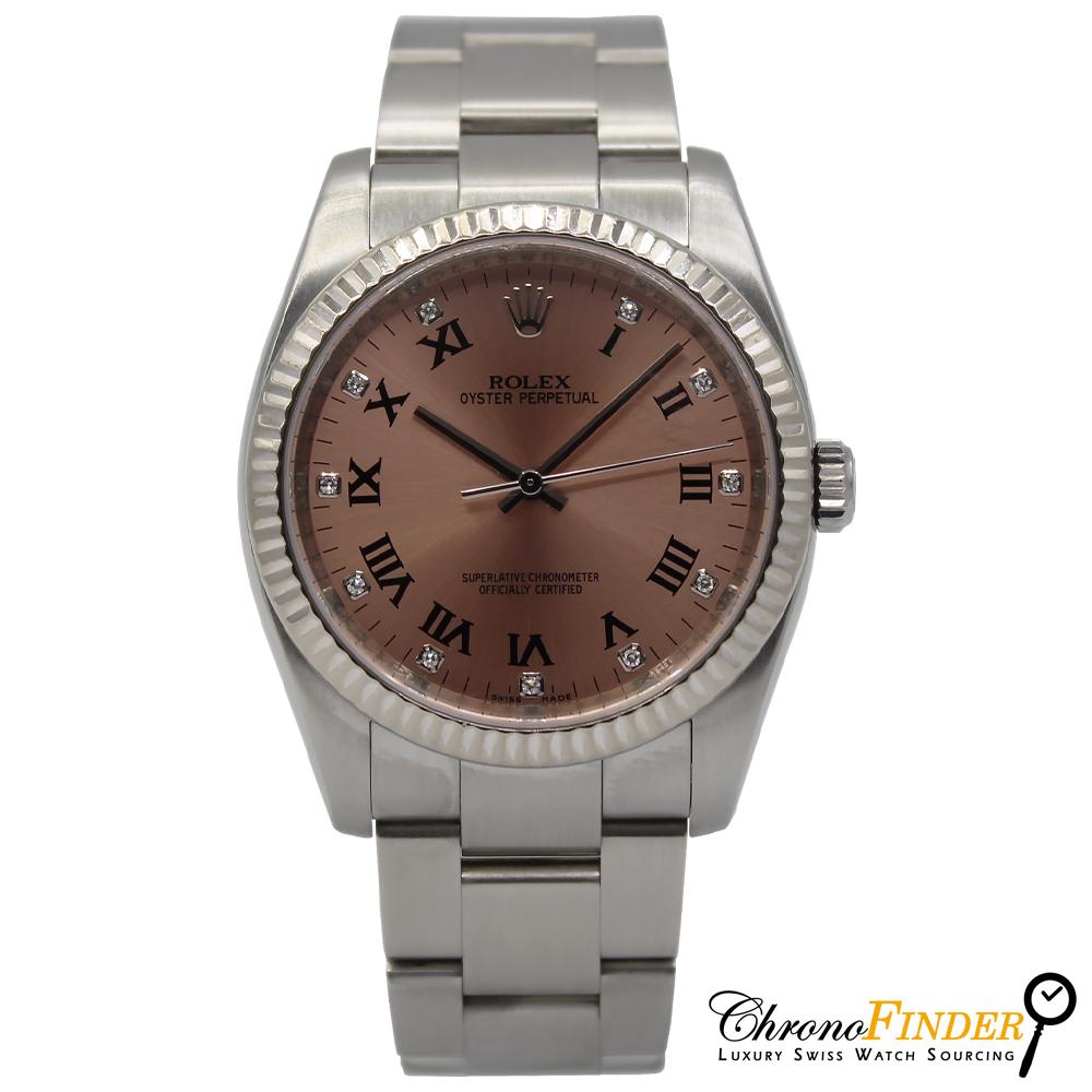 Rolex Oyster Perpetual 36mm model 116034 with a pink diamond dial