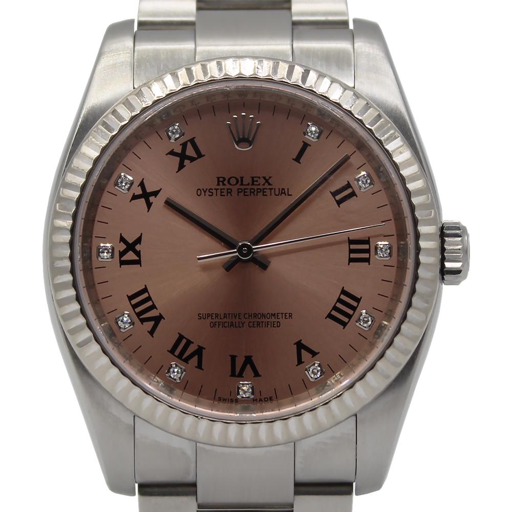 Rolex Oyster Perpetual 36mm model 116034 featuring a pink diamond dial