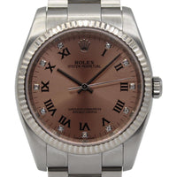 Rolex Oyster Perpetual 36mm model 116034 featuring a pink diamond dial