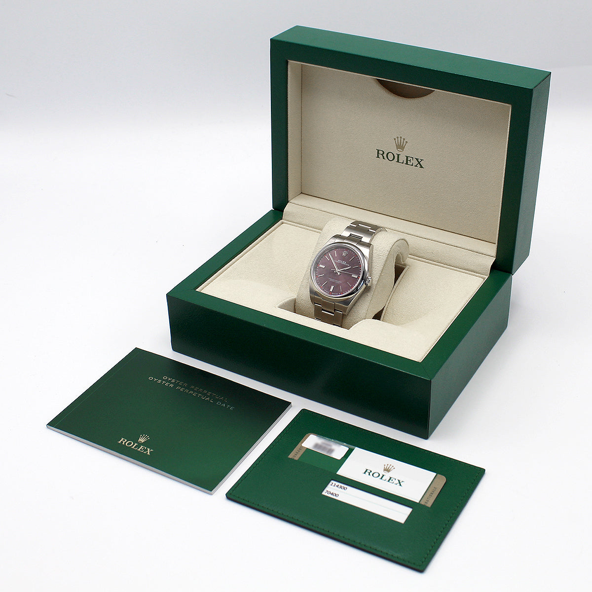 Rolex Oyster Perpetual 39mm model 114300 vibrant red grape dial and stainless steel case