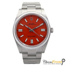 Rolex Oyster Perpetual 41mm model 124300 vibrant coral red dial and stainless steel case