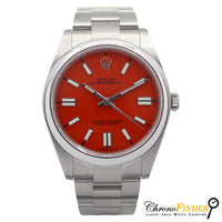 Rolex Oyster Perpetual 41mm model 124300 vibrant coral red dial and stainless steel case