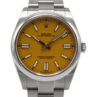 Rolex Oyster Perpetual 41mm model 124300 mustard yellow dial, set in a stainless steel case