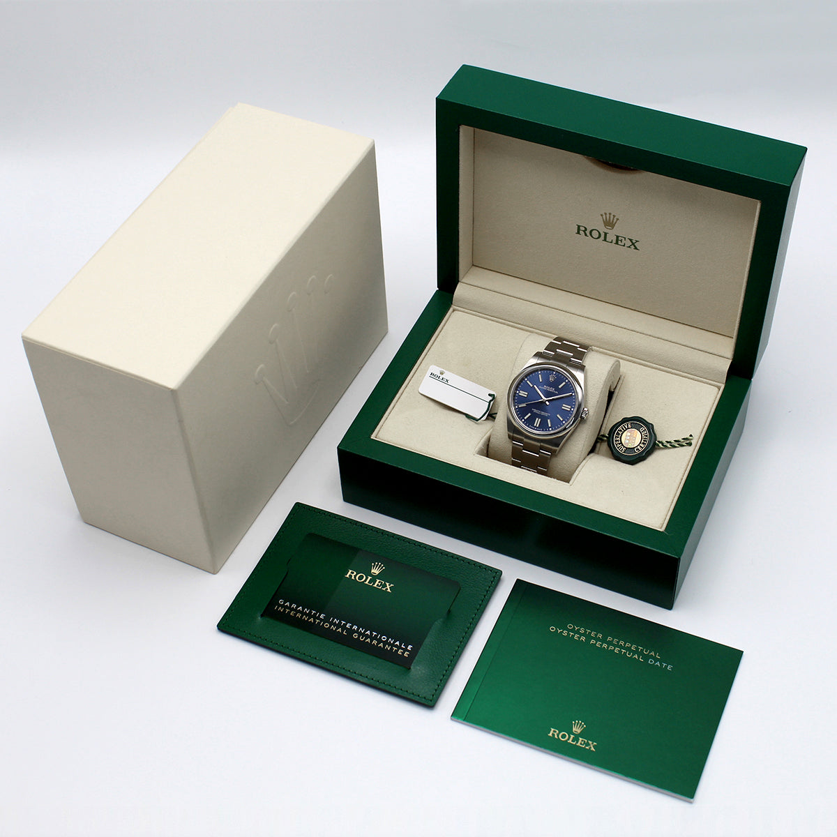 Rolex Oyster Perpetual 41mm model 124300 deep navy blue dial and stainless steel case