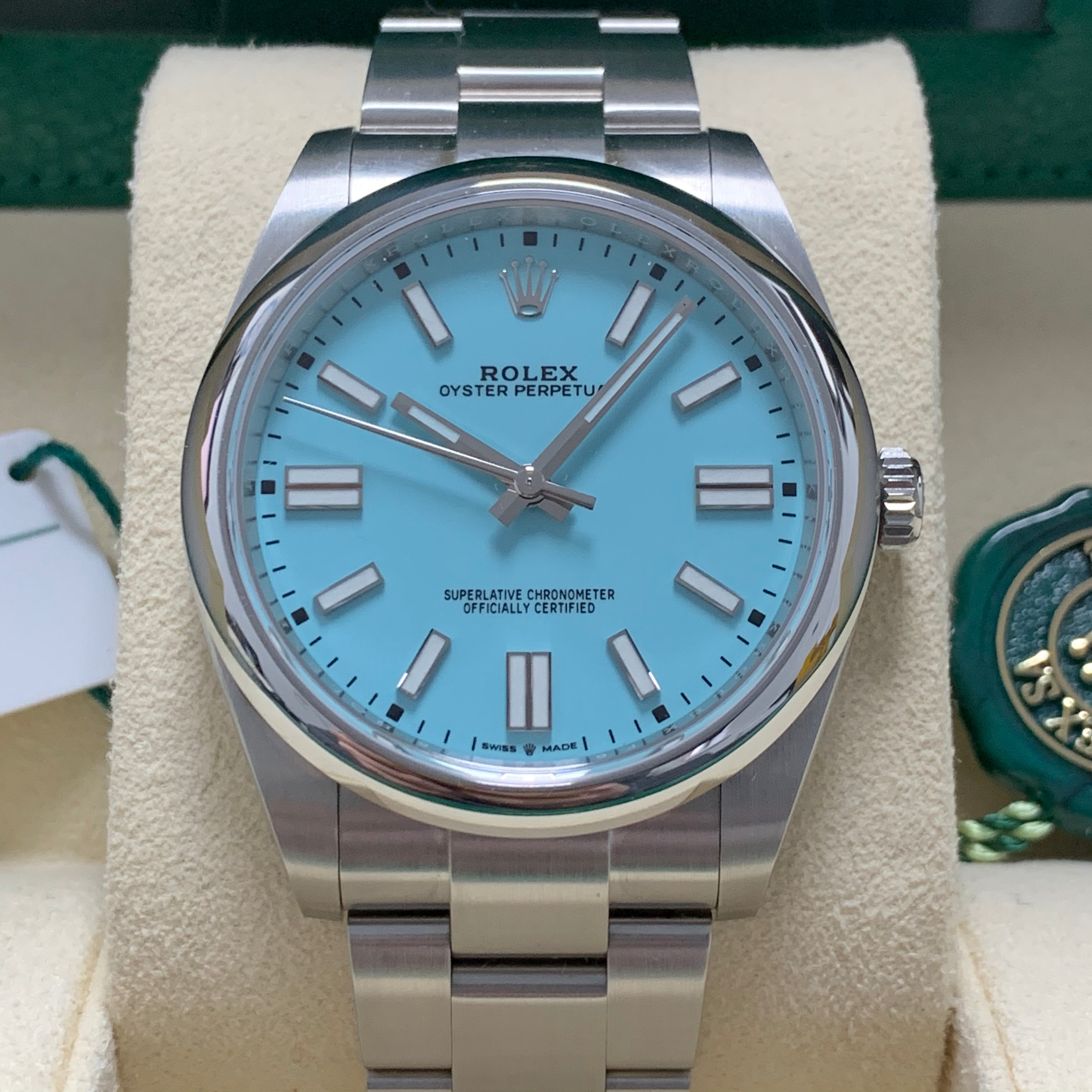 Rolex Oyster Perpetual 41mm model 124300 striking turquoise blue dial, smooth stainless steel bezel