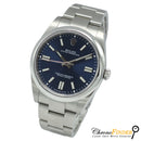 Rolex Oyster Perpetual 41mm model 124300 navy blue dial, featuring a stainless steel case