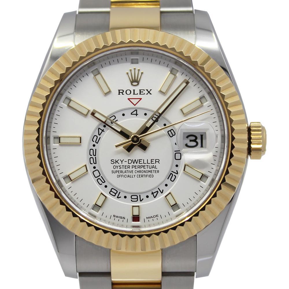 Rolex Sky-Dweller 326933 with a white dial and yellow gold case, highlighting its elegant design.