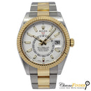 Rolex Sky-Dweller 326933 with a white dial and yellow gold case.