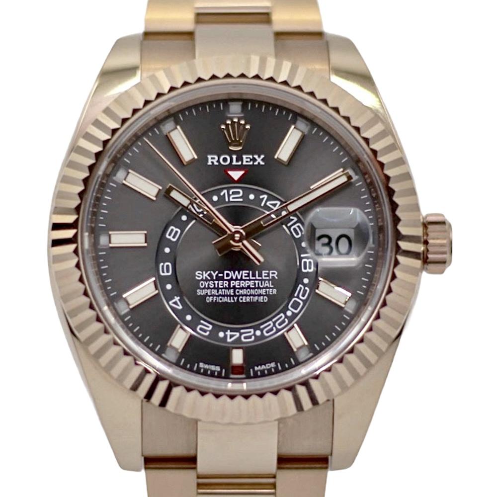 Rolex Sky-Dweller 326935 with a rhodium dial and Everose gold case, featuring a sleek and modern design